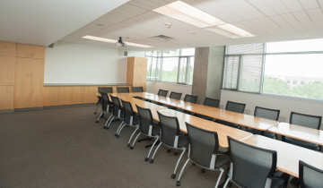 Pryz conference room with conference table and chairs