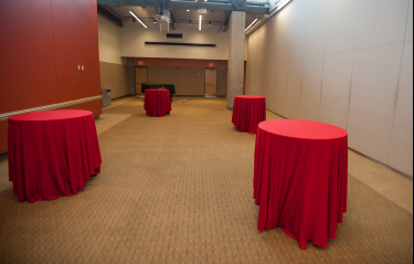 Pryz tables with red tableclothes